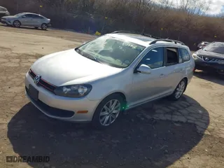 2014 Volkswagen Jetta SportWagen TDI w/Sunroof & Nav with VIN 3VWPL7AJ1EM627958, listed as a IAAI auction lot 41651554 with 193,966 mi miles. Bid and sale history available at carsss.com. Image 2.