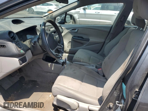 2013 Honda Insight z VIN JHMZE2H31DS000827, wystawiony jako Copart lot #60745645 z przebiegiem 172 694 mil mil oraz Szkoda całkowita • Salvage title. Historia ofert i sprzedaży dostępna na DreamBid. Obrazek 7.