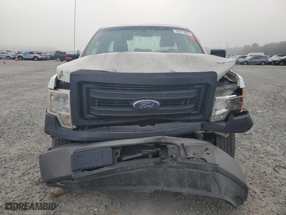 2014 Ford F-150 XL with VIN 1FTMF1CM7EKD61547, listed as a Copart auction lot 74311804 with 175,203 mi miles and Salvage Title. Bid and sale history available at carsss.com. Image 5.