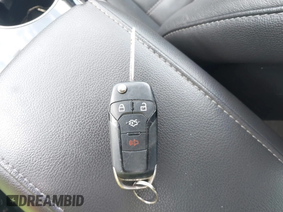 2014 Ford Fusion SE Hybrid with VIN 3FA6P0LU3ER152517, listed as a IAAI auction lot 42801042 with 209,898 mi miles and . Bid and sale history available at DreamBid. Image 11.
