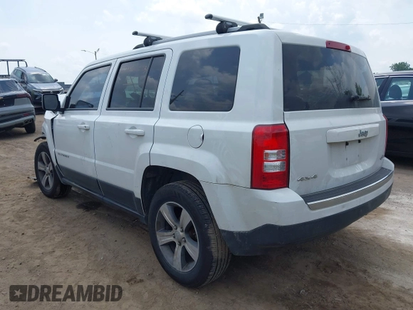 2016 Jeep Patriot Latitude with VIN 1C4NJRFB5GD674048, listed as a IAAI auction lot 42502023 with 128,127 mi miles and . Bid and sale history available at DreamBid. Image 3.