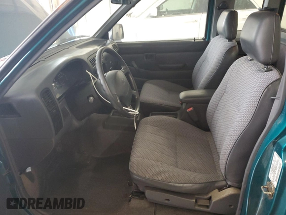 1997 Nissan Frontier XE with VIN 1N6SD16SXVC346717, listed as a Copart auction lot 55442215 with 112,343 mi miles and Salvage title. Bid and sale history available at DreamBid. Image 7.