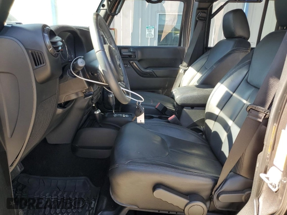 2017 Jeep Wrangler Unlimited Sahara with VIN 1C4BJWEG0HL727423, listed as a Copart auction lot 56719285 with 62,965 mi miles and Salvage title. Bid and sale history available at DreamBid. Image 7.