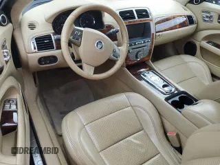 2011 Jaguar XK with VIN SAJWA4GB0BLB38875, listed as a Copart auction lot 52045805 with 35,487 mi miles and Salvage Title. Bid and sale history available at carsss.com. Image 8.