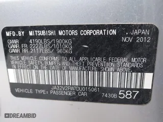2013 Mitsubishi Lancer SE with VIN JA32V2FW7DU015061, listed as a IAAI auction lot 41863621 with 141,315 mi miles. Bid and sale history available at carsss.com. Image 9.