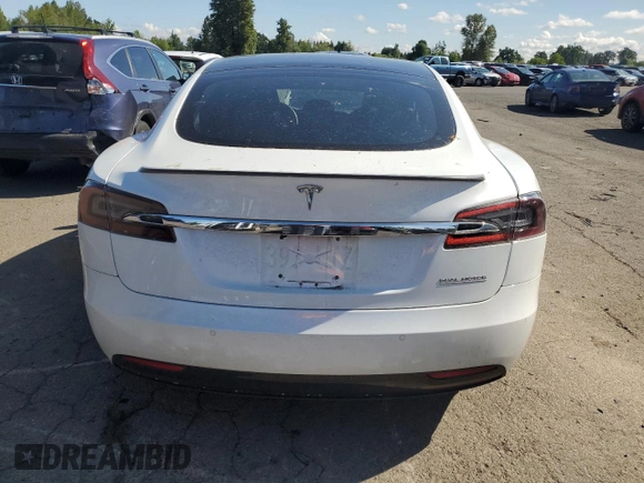2019 Tesla Model S 100D with VIN 5YJSA1E41KF330631, listed as a Copart auction lot 55360295 with 52,245 mi miles and Salvage title. Bid and sale history available at DreamBid. Image 6.