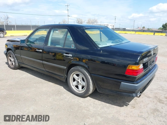 1987 Mercedes-Benz 300 with VIN WDBEA30D8HA397811, listed as a IAAI auction lot 41868336 with 124,720 mi miles. Bid and sale history available at carsss.com. Image 3.