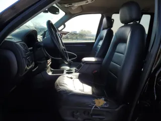 2003 Ford Explorer Limited z VIN 1FMZU75K13ZA06027, wystawiony jako Copart lot #81555664 z przebiegiem 192 382 mil mil oraz Szkoda całkowita • Salvage title. Historia ofert i sprzedaży dostępna na DreamBid. Obrazek 7.