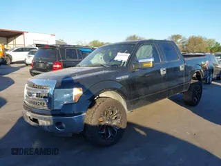 2014 Ford F-150 XL with VIN 1FTEW1CM6EFB40597, listed as a IAAI auction lot 41832554 with 159,192 mi miles and . Bid and sale history available at DreamBid. Image 2.