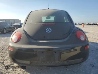 2010 Volkswagen New Beetle Coupe with VIN 3VWPW3AG8AM010698, listed as a Copart auction lot 77705604 with 131,058 mi miles and Salvage Title. Bid and sale history available at carsss.com. Image 6.
