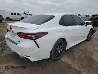 2023 Toyota Camry SE with VIN 4T1T11AK7PU794008, listed as a Copart auction lot 87601715 with 22,560 mi miles and Salvage Title. Bid and sale history available at DreamBid. Image 3.