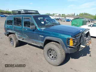 1996 Jeep Cherokee SE z VIN 1J4FJ28S0TL209941, wystawiony jako IAAI lot #42388777 z przebiegiem 167 159 mil mil oraz . Historia ofert i sprzedaży dostępna na DreamBid. Obrazek 1.