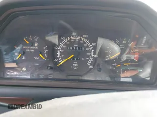 1993 Mercedes-Benz 300 with VIN WDBEA28E0PB988831, listed as a IAAI auction lot 41790609 with 197,915 mi miles and . Bid and sale history available at DreamBid. Image 7.