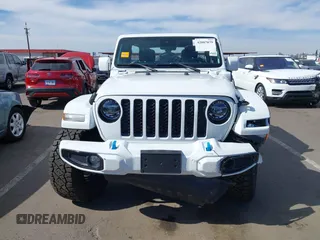 2021 Jeep Wrangler Unlimited Sahara with VIN 1C4JJXP63MW716690, listed as a IAAI auction lot 42087879 with 40,889 mi miles and . Bid and sale history available at DreamBid. Image 12.