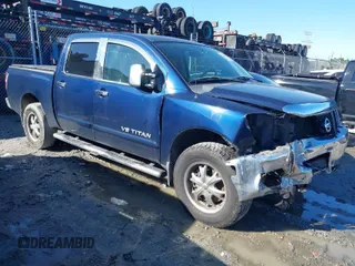 2011 Nissan Titan SL with VIN 1N6AA0EC0BN323844, listed as a IAAI auction lot 41768462 with 106,732 mi miles. Bid and sale history available at carsss.com. Image 1.