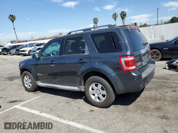 2009 Ford Escape Hybrid with VIN 1FMCU493X9KB03901, listed as a Copart auction lot 52353675 with 145,444 mi miles and Salvage title. Bid and sale history available at DreamBid. Image 2.