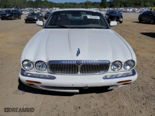 2000 Jaguar XJ with VIN SAJDA14C2YLF11720, listed as a Copart auction lot 73523584 with 119,188 mi miles and Clean Title. Bid and sale history available at carsss.com. Image 5.