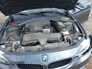 2015 BMW 4 Series 428i xDrive z VIN WBA4A7C5XFD415131, wystawiony jako IAAI lot #42100618 z przebiegiem 89 093 mil mil oraz . Historia ofert i sprzedaży dostępna na DreamBid. Obrazek 10.