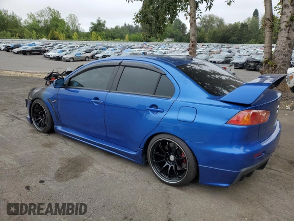 2008 Mitsubishi Lancer Evolution GSR with VIN JA3AW86VX8U044188, listed as a Copart auction lot 70872314 with 0 mi miles and Salvage Title. Bid and sale history available at carsss.com. Image 2.
