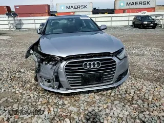 2016 Audi A6 Prestige z VIN WAUHGAFC1GN080778, wystawiony jako Copart lot #60999185 z przebiegiem 62 447 mil mil oraz Szkoda całkowita • Salvage title. Historia ofert i sprzedaży dostępna na DreamBid. Obrazek 13.