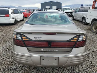 2001 Pontiac Bonneville SE with VIN 1G2HX54K514246161, listed as a Copart auction lot 80767114 with 119,548 mi miles and Salvage Title. Bid and sale history available at carsss.com. Image 6.