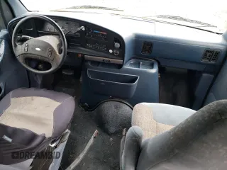 1994 Ford Econoline Wagon XL z VIN 1FBJS31H1RHB32773, wystawiony jako Copart lot #82008864 z przebiegiem Nie podano mil oraz Tytuł czysty. Historia ofert i sprzedaży dostępna na DreamBid. Obrazek 8.