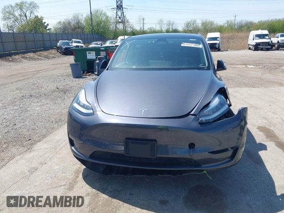 2022 Tesla Model Y Long Range with VIN 7SAYGDEE3NA007737, listed as a IAAI auction lot 42128359 with 42,597 mi miles and . Bid and sale history available at carsss.com. Image 13.