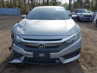 2018 Honda Civic Sedan LX with VIN 2HGFC2F5XJH573938, listed as a IAAI auction lot 42098109 with 69,037 mi miles. Bid and sale history available at carsss.com. Image 12.