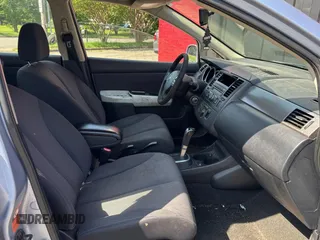 2009 Nissan Versa S with VIN 3N1BC13E99L412868, listed as a Copart auction lot 55990665 with 214,080 mi miles and Clean Title. Bid and sale history available at DreamBid. Image 5.
