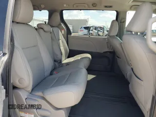2015 Toyota Sienna XLE with VIN 5TDYK3DC4FS619385, listed as a Copart auction lot 57090385 with 112,896 mi miles and Salvage title. Bid and sale history available at DreamBid. Image 11.