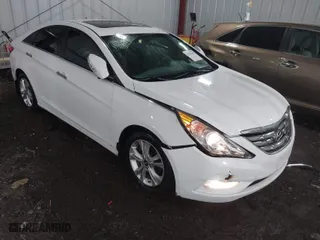 2013 Hyundai Sonata SE with VIN 5NPEC4AC0DH599584, listed as a IAAI auction lot 41961659 with 122,296 mi miles. Bid and sale history available at carsss.com. Image 1.