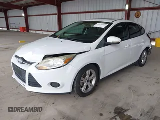 2014 Ford Focus SE with VIN 1FADP3K21EL301336, listed as a IAAI auction lot 41939452 with 118,203 mi miles. Bid and sale history available at carsss.com. Image 2.
