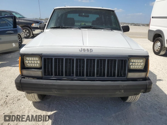 1994 Jeep Cherokee SE with VIN 1J4FT28SXRL151422, listed as a Copart auction lot 77358594 with 74,628 mi miles and Salvage Title. Bid and sale history available at carsss.com. Image 5.