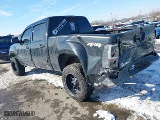 2013 GMC Sierra 1500 SLT with VIN 3GTP2WE79DG377543, listed as a IAAI auction lot 41407899 with 101,827 mi miles. Bid and sale history available at carsss.com. Image 3.