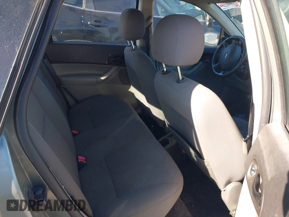 2006 Ford Focus S z VIN 1FAFP37N16W164037, wystawiony jako IAAI lot #41035779 z przebiegiem 251 770 mil mil oraz . Historia ofert i sprzedaży dostępna na DreamBid. Obrazek 8.