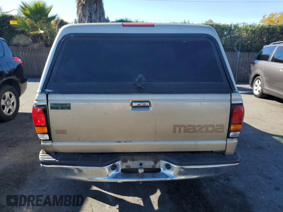 1999 Mazda B-Series Truck SX z VIN 4F4YR12C1XTM39102, wystawiony jako Copart lot #83462634 z przebiegiem 241 380 mil mil oraz Szkoda całkowita • Salvage title. Historia ofert i sprzedaży dostępna na DreamBid. Obrazek 6.