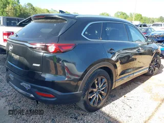 2019 Mazda CX-9 Grand Touring with VIN JM3TCBDY7K0302444, listed as a IAAI auction lot 41998110 with 166,298 mi miles and . Bid and sale history available at DreamBid. Image 4.