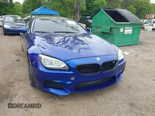 2014 BMW M6 z VIN WBS6C9C54EDV73943, wystawiony jako IAAI lot #42294944 z przebiegiem 129 823 mil mil oraz . Historia ofert i sprzedaży dostępna na DreamBid. Obrazek 6.