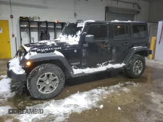 2014 Jeep Wrangler Unlimited Rubicon X with VIN 1C4HJWFG0EL117655, listed as a Copart auction lot 44317685 with 99,174 mi miles and Salvage title. Bid and sale history available at DreamBid. Image 1.