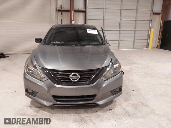 2018 Nissan Altima 2.5 SR with VIN 1N4AL3AP1JC203798, listed as a IAAI auction lot 41853789 with 77,875 mi miles. Bid and sale history available at carsss.com. Image 12.