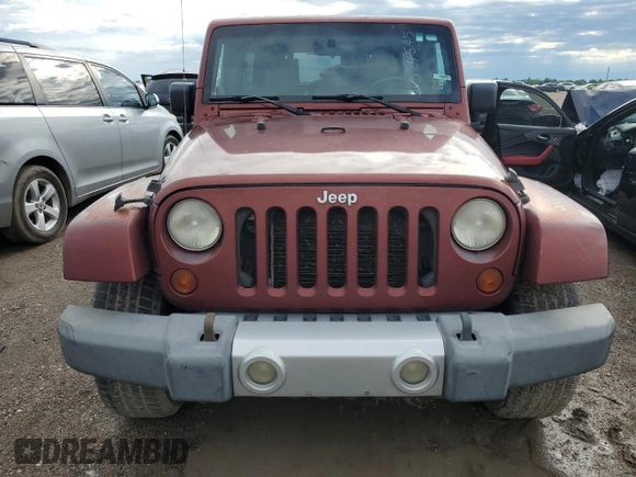 2008 Jeep Wrangler Unlimited Sahara with VIN 1J4GA59128L623399, listed as a Copart auction lot 56524545 with 219,096 mi miles and Clean Title. Bid and sale history available at DreamBid. Image 5.