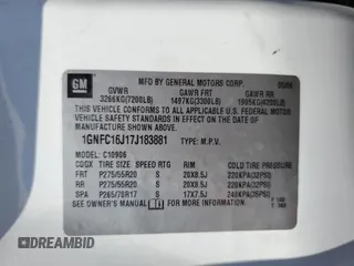 2007 Chevrolet Suburban LT z VIN 1GNFC16J17J183881, wystawiony jako Copart lot #63805785 z przebiegiem 157 331 mil mil oraz Szkoda całkowita • Salvage title. Historia ofert i sprzedaży dostępna na DreamBid. Obrazek 13.