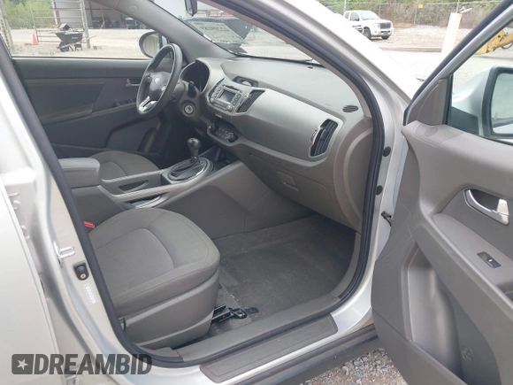 2013 Kia Sportage LX z VIN KNDPBCA20D7419196, wystawiony jako IAAI lot #42209189 z przebiegiem 146 591 mil mil oraz . Historia ofert i sprzedaży dostępna na DreamBid. Obrazek 5.