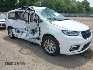 2023 Chrysler Pacifica Touring L with VIN 2C4RC1BGXPR531396, listed as a IAAI auction lot 42492340 with Not provided miles and . Bid and sale history available at DreamBid. Image 1.