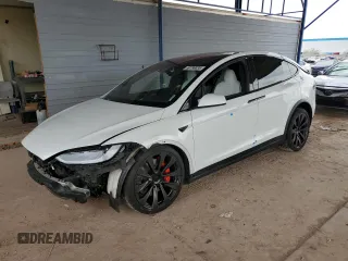 2023 Tesla Model X Plaid with VIN 7SAXCBE64PF405369, listed as a Copart auction lot 50796835 with 36,664 mi miles and Salvage Title. Bid and sale history available at DreamBid. Image 1.