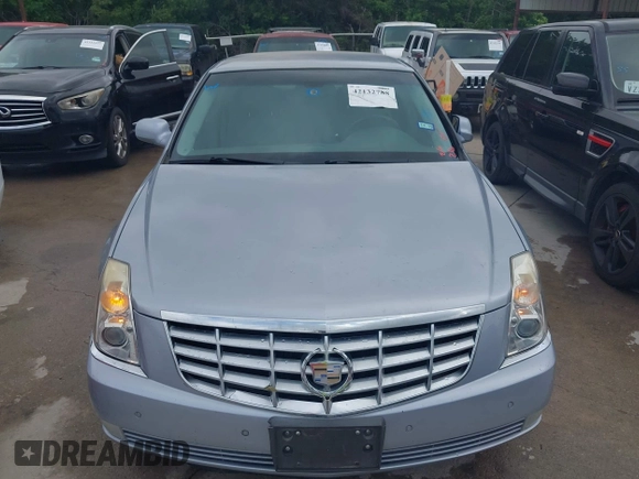 2006 Cadillac DTS w/1SC with VIN 1G6KD57Y06U193325, listed as a IAAI auction lot 42132788 with 107,472 mi miles. Bid and sale history available at carsss.com. Image 6.