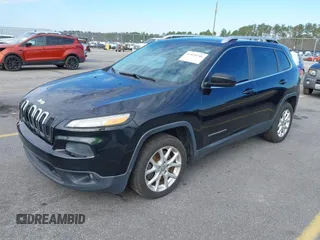 2014 Jeep Cherokee Latitude with VIN 1C4PJLCB0EW288309, listed as a IAAI auction lot 41624746 with 164,037 mi miles and . Bid and sale history available at DreamBid. Image 19.