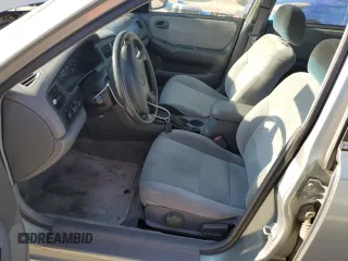 1999 Mazda 626 ES with VIN 1YVGF22C4X5887335, listed as a Copart auction lot 51726654 with 147,359 mi miles and Salvage Title. Bid and sale history available at carsss.com. Image 7.