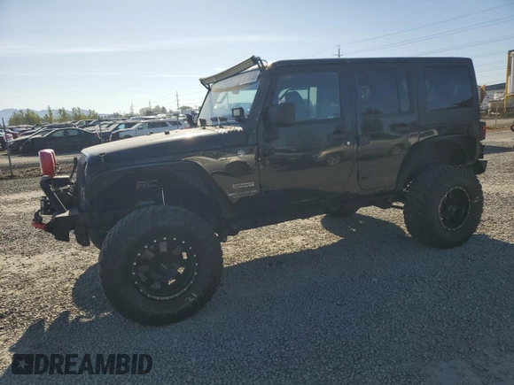 2014 Jeep Wrangler Unlimited Sport with VIN 1C4BJWDG1EL308834, listed as a Copart auction lot 53710065 with 127,612 mi miles and Clean Title. Bid and sale history available at DreamBid. Image 1.