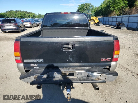 2003 GMC Sierra 1500 SLT z VIN 2GTEK19T831202788, wystawiony jako Copart lot #57964195 z przebiegiem Nie podano mil oraz Czysty tytuł • Clean title. Historia ofert i sprzedaży dostępna na DreamBid. Obrazek 6.
